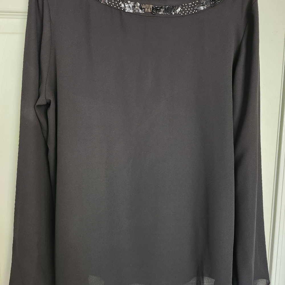 A black blouse for all occasions.